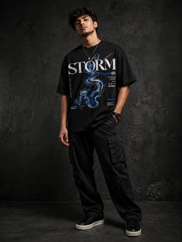 Storm World oversized black printed graphic t-shirt for men with blue swirl design - streetwear fashion - Voux.in
